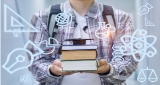 A person holding books, symbols on screen.